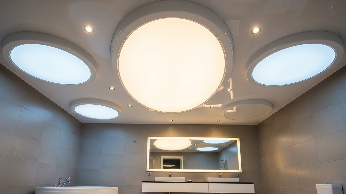 Монтаж натяжных потолков с круглыми и овальными формами для ванных комнат